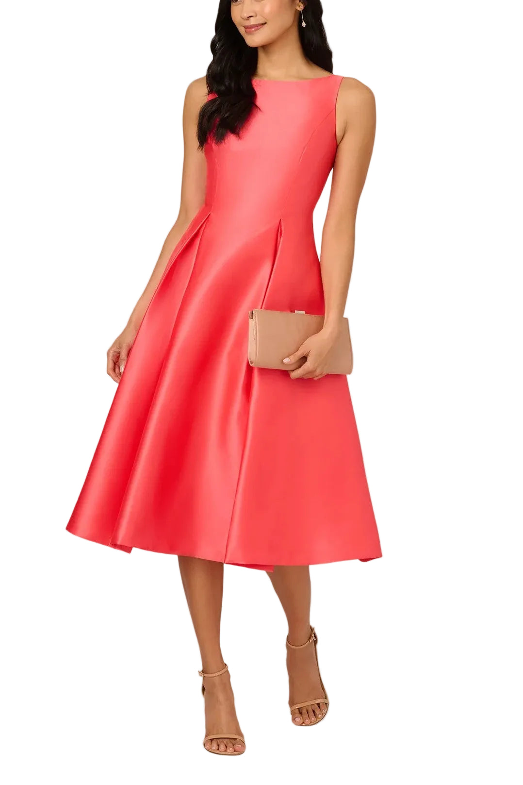 Woman wearing a bright pink dress with a beige clutch against a plain background