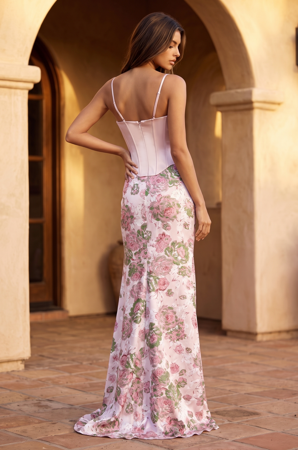 Close-up of the floral corset gown in Baby Pink.