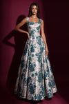 Front view of the square-neck brocade gown in Green