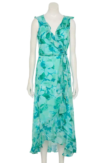 Mannequin wearing a turquoise floral dress on a white background