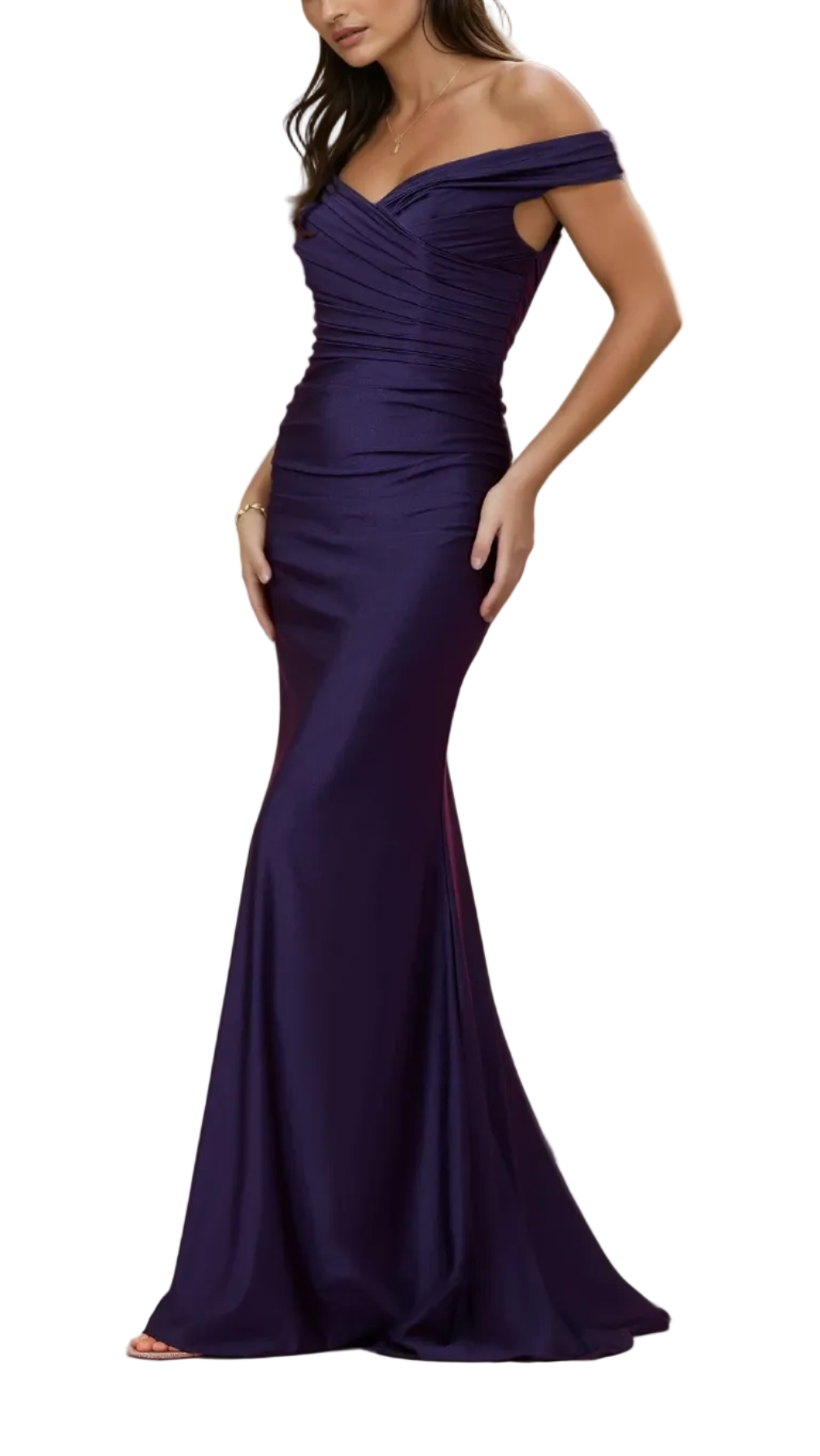 Woman in a dark purple off-shoulder gown standing on a balcony with classical architecture.