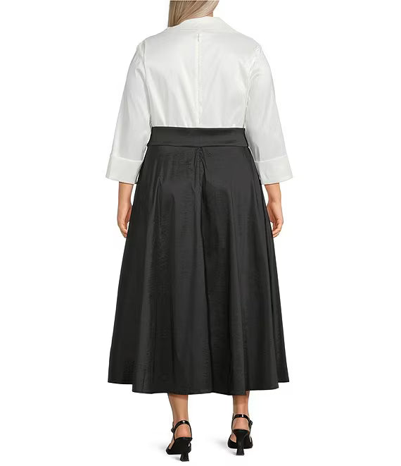 Person wearing a white blouse and black skirt on a white background