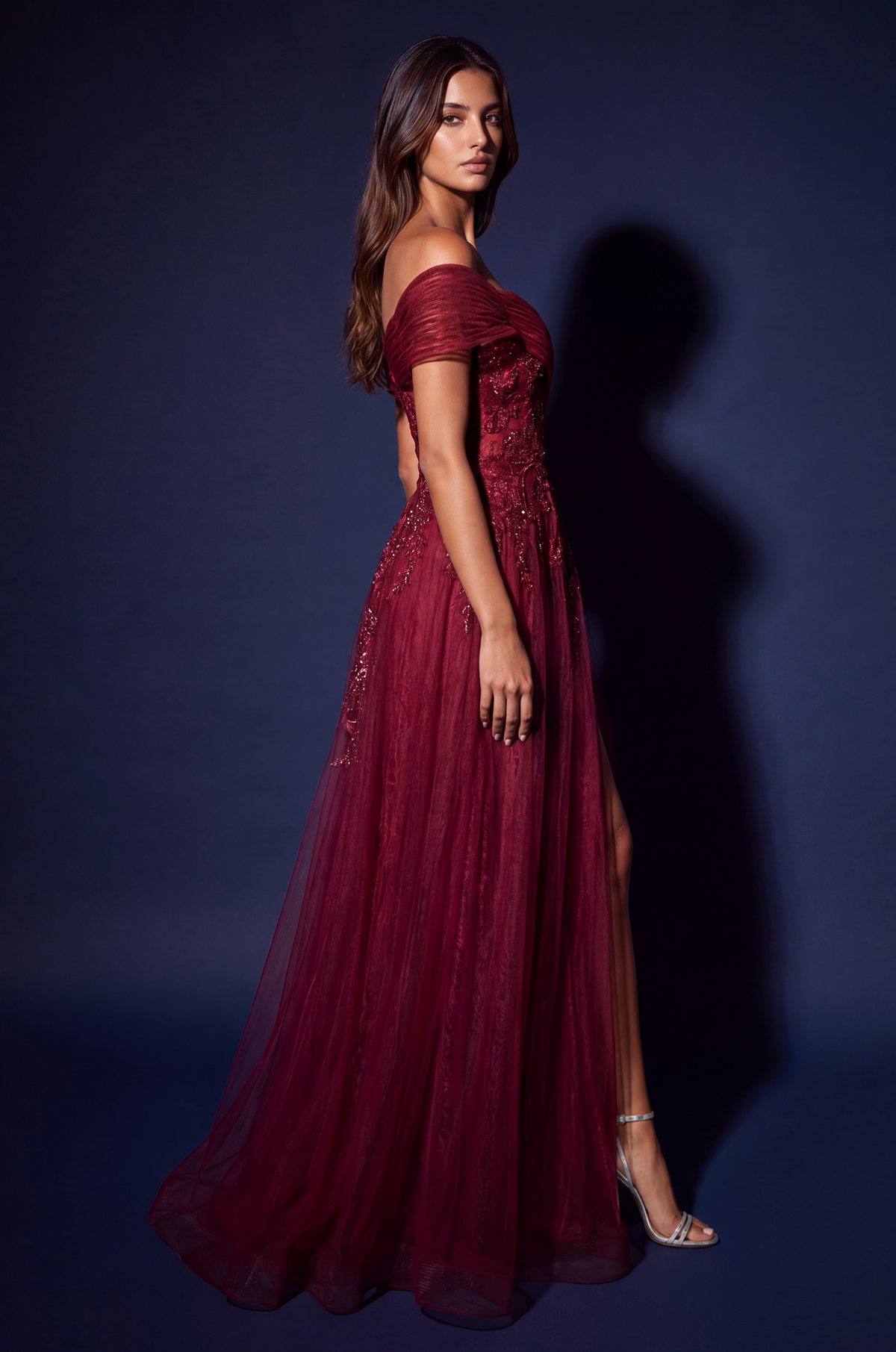 Side view of off shoulder floral A-line gown in Burgundy